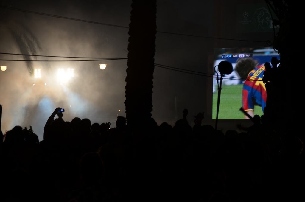 Lionel Messi celebrates his goal on the big screen / Ben Sutherland